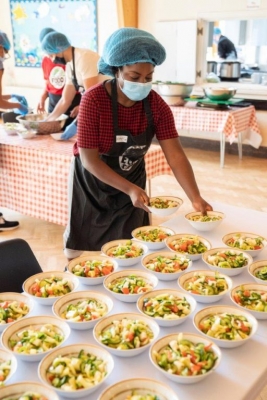 FoodCycle volunteer preparing meals